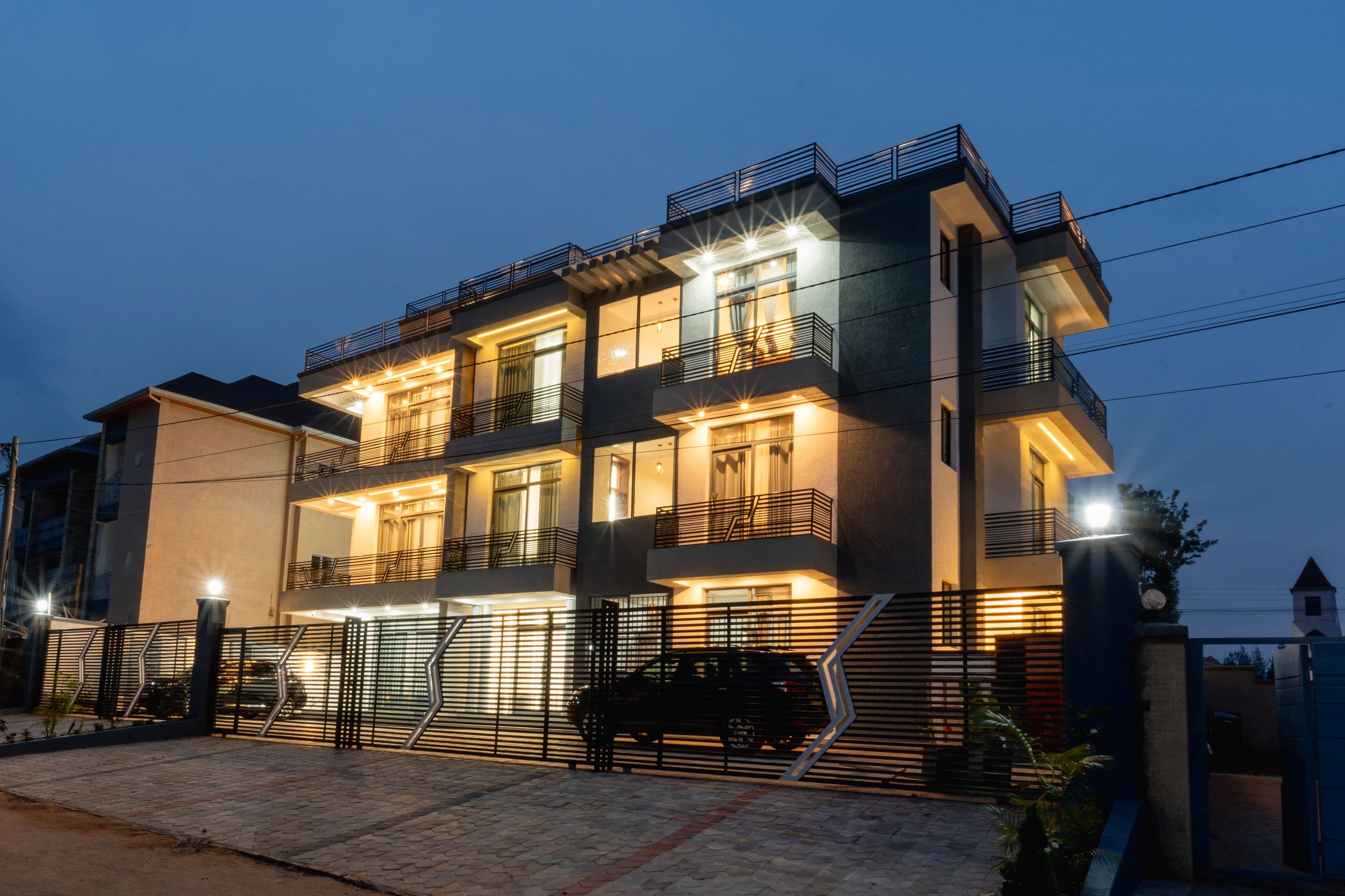 Unica House Evening Side View